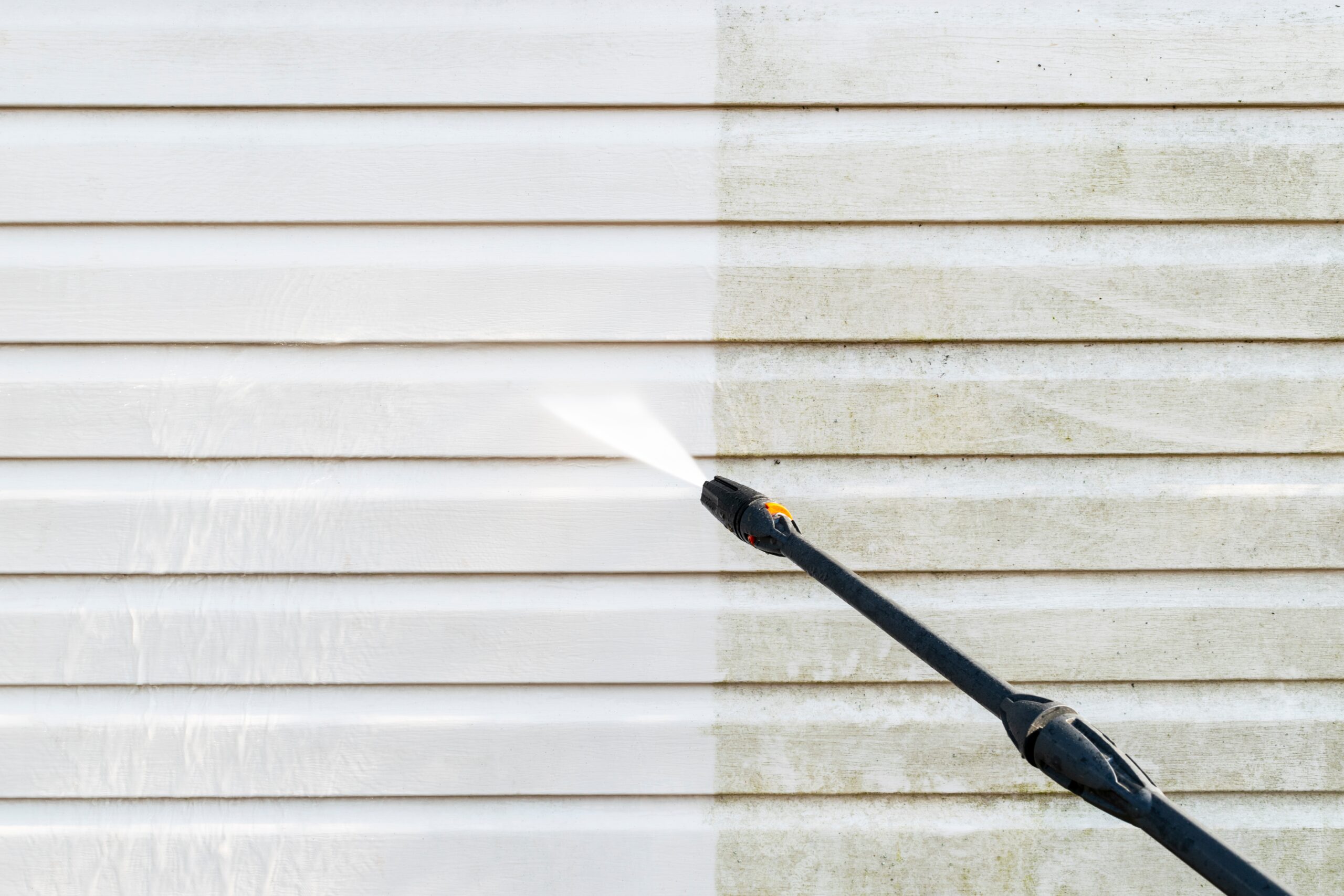 Power washing home siding in Alexandria, VA, 22309 by Blue Ridge Lawn Care Services